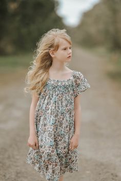 This elegant smocked dress is made of high quality turquoise floral fabric and finished off with blue stitch hand smocking around the chest. The dress is perfect for casual wear and formal occasions as well. This dress is made of 100% cotton fabric which will keep your little cool and comfortable. *  100% Cotton *  Handmade *  Two Layers *  Tie at the back *  Lightweight, soft cotton, comfortable, and ready to play *  Hand wash or machine wash on a delicate setting We are based in Sydney, New So Blue Smocked Dress With Gathered Neckline For Summer, Hand Smocking, Hand Smock, Different Dresses, Dress Out, Smocked Dress, Pink Linen, Ready To Play, Dress Purchase