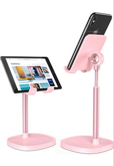 two pink tablet stands with one holding an ipad