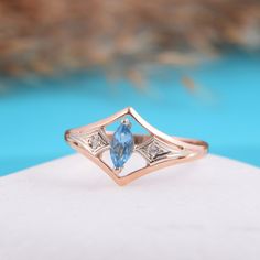 "Anniversary ring, Art deco ring, Topaz ring, Marquise ring, Women ring, Geometric ring, Rose gold ring, Elegant ring, Delicate ring WE OFFER UNLIMITED PERIOD INSTALLMENTS PLAN This is a beautiful, stunning, feminine ring that works well for all occasions, styles, and ages. You will love it! Same ring in white gold: https://www.etsy.com/listing/294832061/topaz-ring-art-deco-ring-gemstone-ring?ref=shop_home_active_1 Ring information: Main stone: Swiss Topaz Approximate size: 6*3 mm Accent stone: Fine Jewelry Marquise Rings As Gift, Fine Jewelry Marquise Rings For Gift, Art Deco Open Ring For Anniversary, Fine Jewelry Marquise Birthstone Ring, Rose Gold Topaz Ring With Diamond Accents, Art Deco Rose Gold Ring With Gemstone, Marquise Topaz Jewelry Gift, Marquise Topaz Ring For Promise Occasion, Marquise Topaz Promise Ring