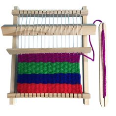 a weaving machine with several colors of yarn and a purple needle on the top of it