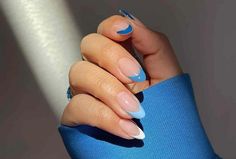 The wide range of blue shades, from baby blue to midnight, offers a playground for creativity. Keep reading to discover striking blue French tip nail designs. We want to inspire you to express yourself and enjoy an unforgettable manicure. French Tip Ideas, Wave Nails, Classy Nail Art, Silver Nail Art