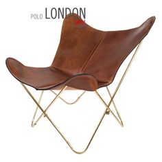 a brown leather chair sitting on top of a metal frame stand with the words polo london above it