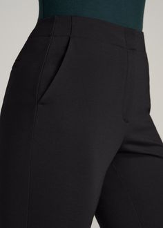 About Our Tall Women’s Slacks Take your workweek wardrobe to the next level in these chic women’s tall dress pants. When it comes to office wear, you want to look and feel your best – but that can be hard when you can’t find clothes that fit your beautiful tall silhouette. It's time to wave goodbye to the days of pants that are way too cropped or have an awkward fit and pick up a pair made for your height. We designed these pants exclusively for women between 5’9” and 6’6” with the finest attent Decent Trousers For Ladies, Tailored Black Dress Pants For Office, Elastane Pantsuit For Business Casual, Elastane Pantsuit For Workwear, Fitted Trousers For Office Lady, Fitted Trousers Dress Pants For Office Lady, Black Stretch Dress Pants For Work, Tailored Bottoms For Business Casual, Tailored Dress Pants For Office