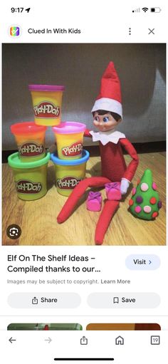 an elf is sitting on the floor next to some ice cream