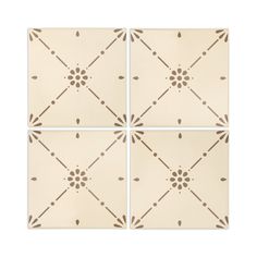 four white tiles with brown designs on the top and bottom, each in different sizes