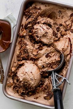 an ice cream dish with chocolate chunks in it