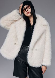 This season, stay warm and toasty in a foxy winter coat! This super soft faux fox fur coat for women is a must-have for any stylish gal! Featuring a classic two button design, you'll be ready to take on chilly weather—no matter how foxy it gets! Faux fox fur Front button closure Notched lapels Dry clean Women's winter jacket/coat Item #310307 Size info XS=US2=UK6=EU32 S=US4-6=UK8-10=EU34-36 M=US8-10=UK12-14=EU38-40 ★★ It would be helpful if you provided your height and weight so that I could ass Chic Fur Coat With Faux Fur Lining, Winter White Faux Fur Coat For Fall, Fluffy Winter White Fur Coat For Fall, Short White Fur Jacket, White Fur Coat Short, Elegant Fluffy Mink Outerwear, Faux Fox Fur Coat, Luxury White Faux Fur Outerwear, Luxury White Faux Fur Coat