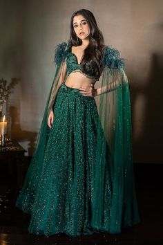 Emerald green attached can-can lehenga with geometric pattern sequin and cutdana embroidery. Paired with cape draped sleeve with feather detailing padded blouse. - Aza Fashions Green Indian Outfit, Emerald Green Lehenga, Lehenga Green, Dress Stitching, Bridesmaid Photoshoot, Sangeet Outfit, Lehenga Pattern, Indian Outfits Lehenga, Lehenga Designs Simple