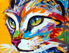 a painting of a cat's face with green eyes and colorful paint strokes on it