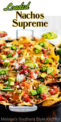 the loaded nachos supreme is ready to be eaten with salsa and avocado