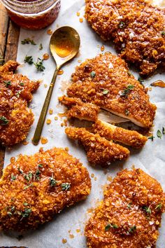 fried chicken cut in half and served on parchment paper