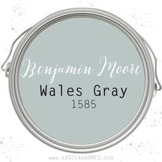 the logo for beryln moore's gray, which has been painted in light blue