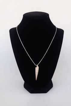 "Beautiful handcrafted real seashell necklace made with sustainably sourced and hand picked shells from local beaches in Florida. Light creme colored auger cone seashell attached to your choice of silver or gold chain.  3/4 to 1 inch length shells 18\" necklace chain length  2\" necklace chain length extension on gold chain selection  Please note that all shells are unique, and while each piece will look very similar to that pictures, fluctuations in the shell are to be expected. USAGE Our luxur Beaches In Florida, Work Function, Necklace Shell, Glam Jewelry, Cotton Jewelry, 2 Necklace, Silver Gift Wrap, Star Chain, Jewelry Dainty