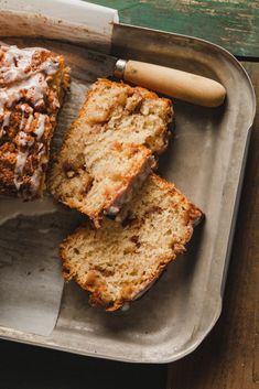 slices of banana bread on a tray with a rolling pin