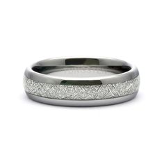 a wedding band with white gold inlays