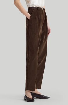 Tailored from plush corduroy, these tapered-leg pants feature reversed front pleats that create a relaxed fit. 27" inseam; 15" leg opening; 13" front rise; 16 1/2" back rise (size 42FR) Zip fly with button closure Front slant pockets; back button-welt pockets 100% cotton Dry clean Made in Italy Designer Clothing Corduroy Tapered Leg Pants For Work, Tapered Leg Corduroy Pants For Work, Corduroy Ankle-length Workwear Pants, Corduroy Ankle-length Pants For Work, Ankle-length Corduroy Pants For Work, Elegant Corduroy Bottoms For Work, Elegant Corduroy Bottoms For Fall, Elegant Fall Corduroy Bottoms, Fabric Gift Bags