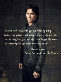 a man standing in front of a wall with a quote from the vampire on it