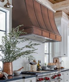 a kitchen with an oven, range and counter tops in it's center island