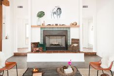 the living room is clean and ready for guests to use it as a focal point