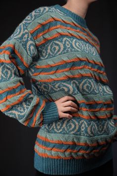 Italian vintage wool sweater in orange and blue. Made from a blend of wool (35 acrylic, alpaca (10%) and mohair (10%). In very good vintage condition, barely any signs of wear.  Size not indicated. The model is 175cm tall, usually wearing a female size M. The sweater fits like about a size XL-XXL for women.  Shoulders 58cm Chest 58cm Sleeve 60cm Length 70cm ... Discount for multiple items, applies automatically at check-out:  3 or 4 items: 15% Off 5 items or more : 25% off Also, please send me y Orange And Blue Sweater, Stephen West Knitting Sweaters, Orange Retro Long Sleeve Sweater, Nordic Knitted Blue Sweater, Retro Blue Knit Sweater, Orange Mohair Sweater, Sweater Fits, Vintage Wool, Vintage Italian