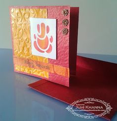 a card with a hand print on it and a red envelope that says happy birthday