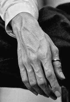 black and white photograph of a man's hands