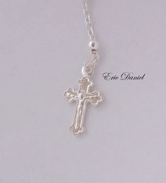 "This beautiful and classic rosary necklace is made from Sterling Silver with round beads. Necklace features a Virgin Mary Medallion as well as a Crucifix. Great gift for religious holidays, confirmation, baptism, Christmas, Easter, etc. Metal Options: *Sterling Silver *Yellow Gold over Silver Bead Size - 3 mm Mary Charm - 10mm Crucifix height - 15mm Choose your length: 18\", 20\", 24\" ------------PRODUCTION ------------ Please allow 3-5 business days for production Shipping Options Available a 8mm Bead Crucifix Jewelry For First Communion, 8mm Bead Crucifix For First Communion, Adjustable Nickel-free Crucifix Necklace, Virgin Mary Rosary, Necklace For Kids, Necklace With Cross, Rosary Bracelet, Rosary Necklace, Pompano Beach