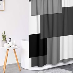 a bathroom with a black and white checkered shower curtain next to a small table