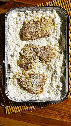 some food that is in a pan on a table