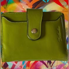 Gorgeous Green Bostanten Wallet Nwot Featuring: Gorgeous Color Green Leather Rfid Security Two Button Closure Design Makes Sure It Stays Closed And Flat When Stuffed Contains 9 Credit Card Slots, 1 Id Window, 1 Coin Zipper Pocket On Back, And 2 Full Length Compartments For Money (Can Hold 40 Bills) Measures Approximately: 3.93”H X 4.72”L X 0.78”D Nwot Smoke Free & Away From Pets Thank You For Visiting Kristine Coin Purse With Snap Closure For Everyday Use, Everyday Coin Purse With Snap Closure, Casual Green Wallet For Daily Use, Green Bifold Coin Purse For Everyday Use, Classic Green Wallet For Daily Use, Green Leather Coin Purse With Rfid Blocking, Everyday Coin Purse With Magnetic Closure, Casual Green Wallets For Everyday Use, Casual Green Wallet For Everyday Use