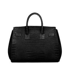 DESIGN
The new Gigi handbag encapsulates Teddy Blake's modern-classic appeal. Made in Italy from croco embossed calf skin the semi structured silhouette is reworked to fit an on-the-go lifestyle. The detachable strap allows it to be styled over the shoulder and the roomy interior can fit all your daily essentials &more.
DESCRIPTION
Made In ItalyCroco embossed leather with matching trimReal suede interiorGold toned hardware
DETAILS
Media10.6"h x 5.7"w x 13.4"lHandle drop length: 3.4"17" to 23 Luxury Crocodile Pattern Top Handle Satchel, Classic Everyday Luxury Bag With Crocodile Pattern, Classic Bags With Crocodile Pattern For Everyday Luxury, Luxury Structured Bag For Everyday, Chic Top Handle Bag With Textured Finish, High-end Business Bag With Crocodile Pattern, Luxury Leather Shoulder Bag With Textured Finish, Designer Formal Bags With Textured Finish, Designer Formal Bag With Textured Finish