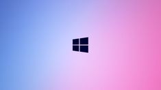 the windows logo is shown on a pink and blue background, with only one window visible