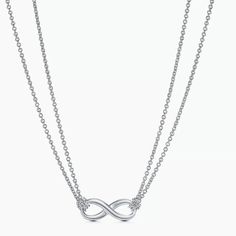 Description & Details Tiffany Infinity Is A Powerful Symbol Of Continuous Connection, Energy And Vitality. The Addition Of Endlessly Looped Double Chains Echoes The Infinite Nature Of The Design. Sterling Silver On An 18" Chain Jewelry Tiffany And Co, Jewelry Tiffany, Infinity Necklace, Tiffany Co Jewelry, Double Chain, Tiffany And Co, Tiffany & Co., Womens Jewelry Necklace, Jewelry Necklaces