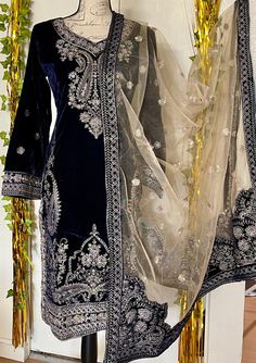 This is a beautiful ready to wear velvet dress for women. It is available in small size only. Small Chest 38 inches all around, waist 34, hips 40 and length 40 inches. This is a fully embroidered Kameez with tilla thread and heavy beads work on it. It comes with jamawar pant and heavy net embroidered dupatta. Beautiful embroidered velvet patches on dupatta. Color navy blue. Fabric velvet. No return or exchange please. Pakistani Velvet Dresses, Dress Pakistani, Designer Salwar Kameez, Beads Work, Velvet Dresses, Designer Salwar, Embroidered Velvet, Embroidered Dupatta, Party Kleidung