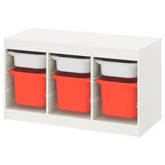 three orange and white buckets in a storage unit