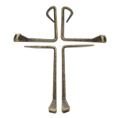 an old fashioned metal cross on a white background