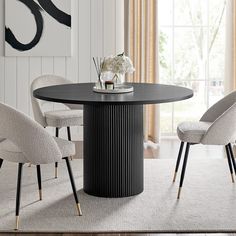 a dining room table with chairs around it