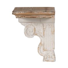 an old white wooden shelf with a wood top and decorative carvings on the sides, isolated against a white background