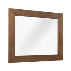 a wooden frame mirror on a white wall with a light brown wood border around it