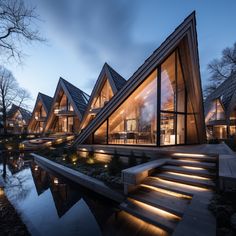 an unusual house is lit up at night