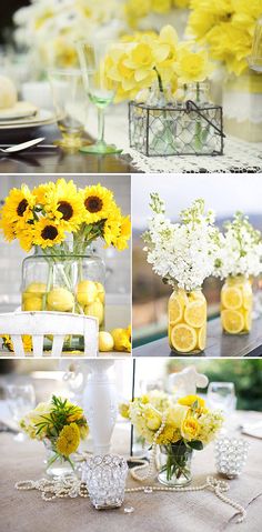 yellow and white flowers are in vases, lemons, and other things on the table