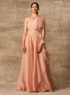 Ridhi Mehra-Peach Ruffle Draped Jumpsuit With Belt-INDIASPOPUP.COM Gown Belt, Ridhi Mehra, Jumpsuit With Belt, Ruffle Saree, Embroidered Crop Tops, Embroidered Belt, One Shoulder Jumpsuit, Indian Gowns, Designer Dresses Indian