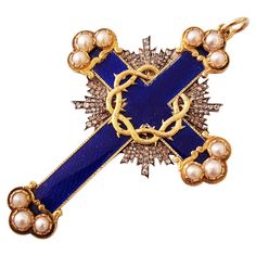 Antique 14k gold large russian cross pendant in blue guilloche enamel with rose cut diamonds estimate weight of 2 carats and 12 white natural pearls this unuswal cross was made in st petersburg 1844.c during the imperial russian era with total lenght 7.5cm and weight of 25 grams cross is hall marked with 56 imperial russian gold standard and st petersburg old assay mark and initial maker mark in cyrllic alphabet (cross is in a very good condition) Russian Cross, Cross Ideas, Pectoral Cross, Enamel Cross, Knight Rider, Religious Jewelry, Rose Cut Diamond, 2 Carat, Natural Pearls