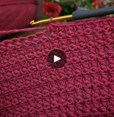 a crochet bag is shown with a video demonstrating how to knit the stitchs