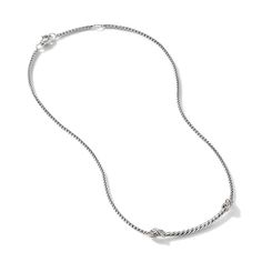 This necklace is crafted with sterling silver and adorned with pave diamonds, making it a valuable addition to the Petite X collection. Bar Station, Curved Bar, Station Necklace, David Yurman, Bar Necklace, Pave Diamonds, Lobster Clasp, Silver Necklace, Diamonds