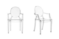 two clear chairs sitting next to each other on a white surface with no one in it