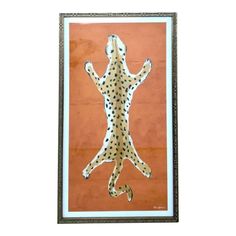 an animal with spots on it's body and legs is shown in a frame