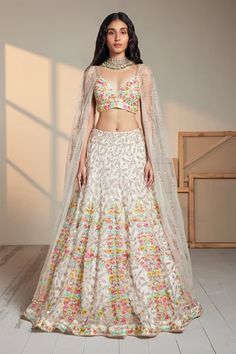 Shop for Chamee and Palak Ivory Silk Calico Floral Embroidered Lehenga And Blouse Set for Women Online at Aza Fashions Lehenga And Blouse, Cape Blouse, Tulle Cape, Net Skirt, Floral Lehenga, Bridal Applique, Net Blouses, Lehenga Style, Embroidered Lehenga