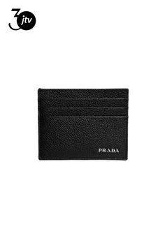 This stylish Prada Card Holder��is the perfect addition to your everyday essentials. The iconic Prada logo plaque is featured prominently on the front face. With six slots for cards as well as one down the middle, there is plenty of storage for all of your needs.��Its small size and neutral color makes this leather card holder perfect to place in your pocket or bag.    Model: 2MC223  Black Vitello Micro Grain Leather  Prada Logo Plaque    Silver-Tone Hardware  6 Card Holder Slots  Middle Slot  M Prada Card Holder, Prada Logo, First Down, Leather Card Holder, Black Card, Card Holder Wallet, Card Holder Leather, Neutral Colors, Everyday Essentials Products