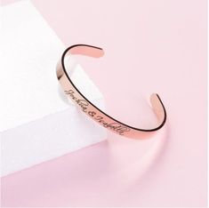 Our beautiful Bangles can be engraved with any name, date or message of your choosing. Capture a meaningful moment in time with our stunning Silver Cuff or Rose Gold Cuff!Personalisable with any wording or numbers of your choice, our Personalised Bangle is the perfect choice for a delicate simple accessory or the ultimate stacking must have.Meticulously crafted using the finest high polished stainless steel, and also available in a premium rose gold plated finish, our gorgeous silver/rose gold b Rose Gold Engraved Bangle For Wedding, Adjustable Rose Gold Bangle As Gift, Adjustable Rose Gold Bangle For Gift, Elegant Wedding Bangle For Mother's Day, Mother's Day Gift Cuff Bracelet, Engraved Rose Gold Bracelets For Wedding, Elegant Name Cuff Bracelet As Gift, Elegant Customizable Bangle For Gift, Elegant Personalized Rose Gold Bangle